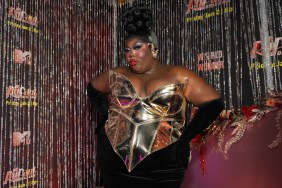 Kenya Pleaser in a black and gold dress at the RuPaul's Drag Race Season 18 premiere party